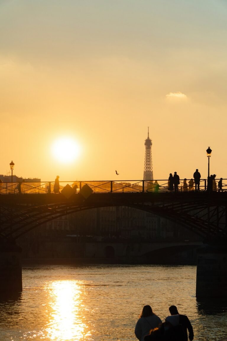Sunset on a bridge over the Seine, Paris, France